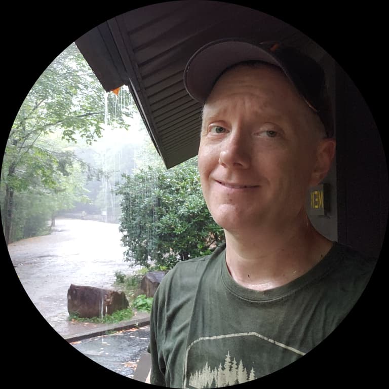 Cory Baggett on a rain-soaked rail trail